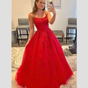 Red lace and tulle prom gown